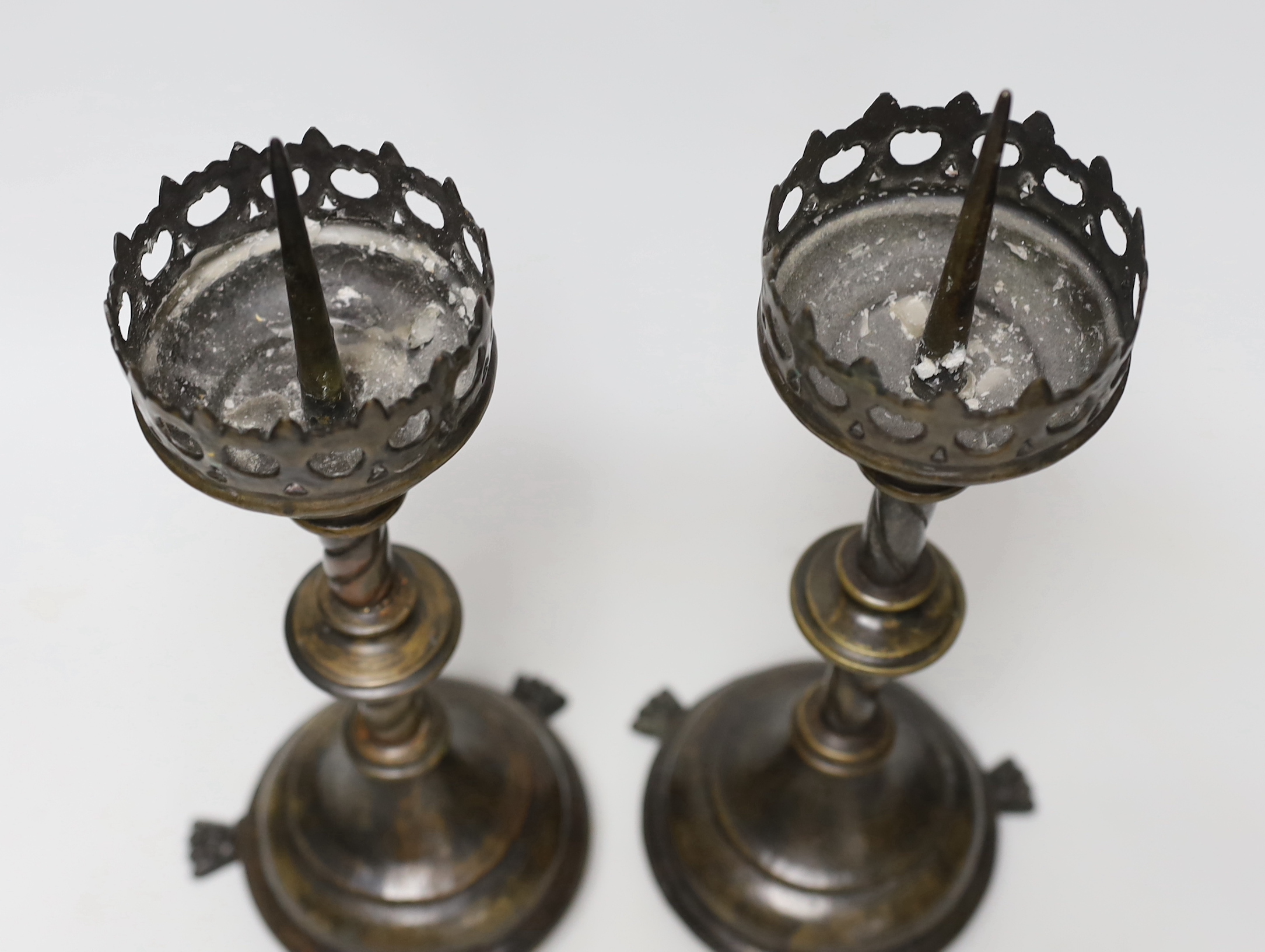 A pair of 19th century pricket candlesticks, 34cm